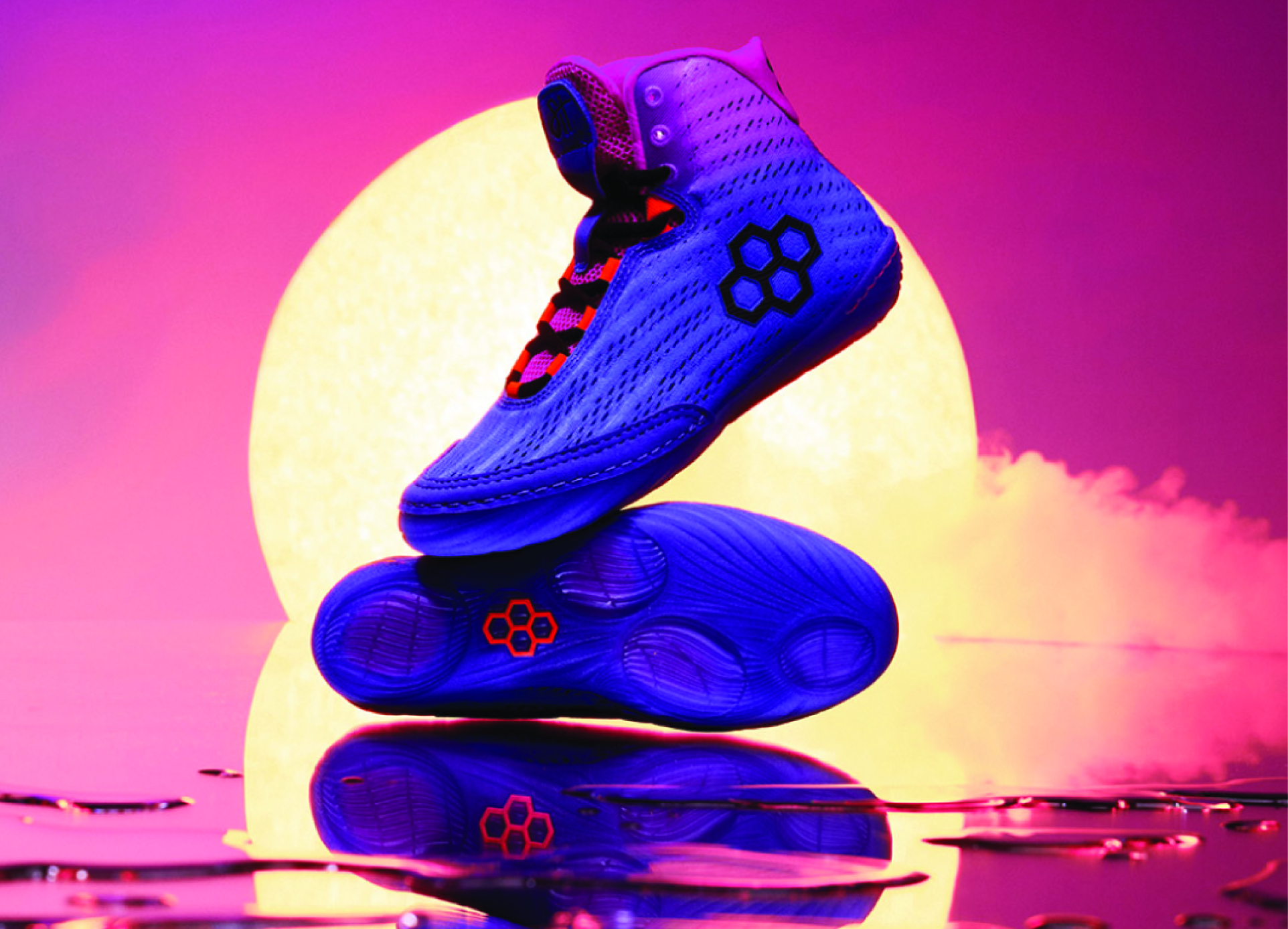 Purple sneakers in front of the setting sun